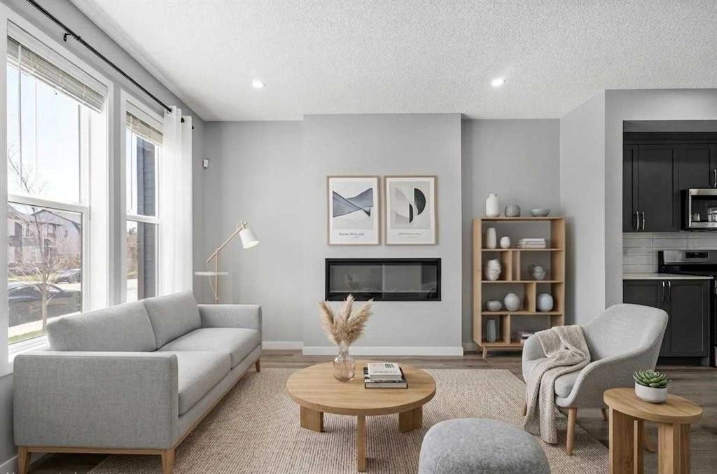 109 Dawson Drive, Chestermere, AB - Indoor Photo Showing Living Room With Fireplace