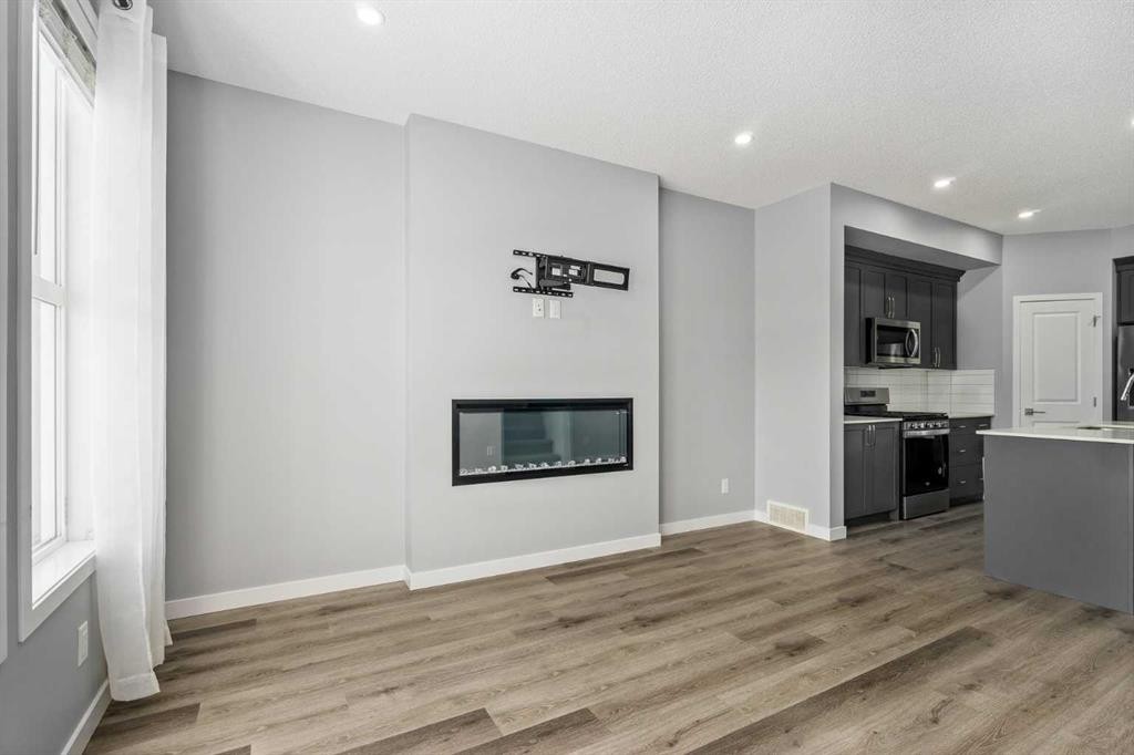 109 Dawson Drive, Chestermere, AB - Indoor With Fireplace