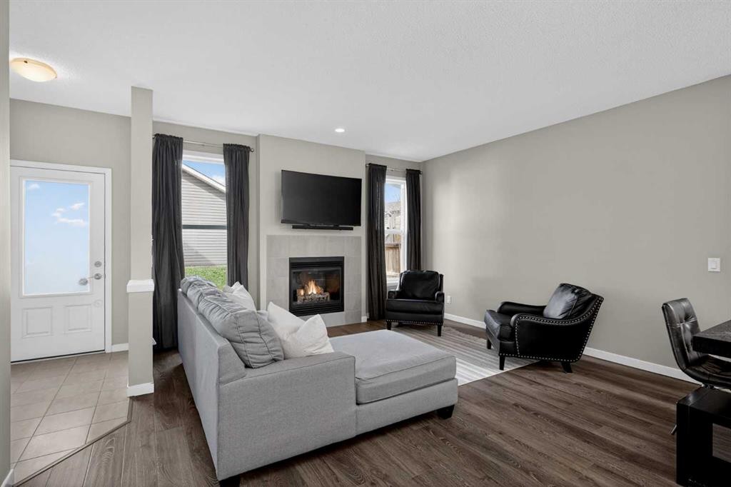 257 Cranford Park Se, Calgary, AB - Indoor Photo Showing Living Room With Fireplace