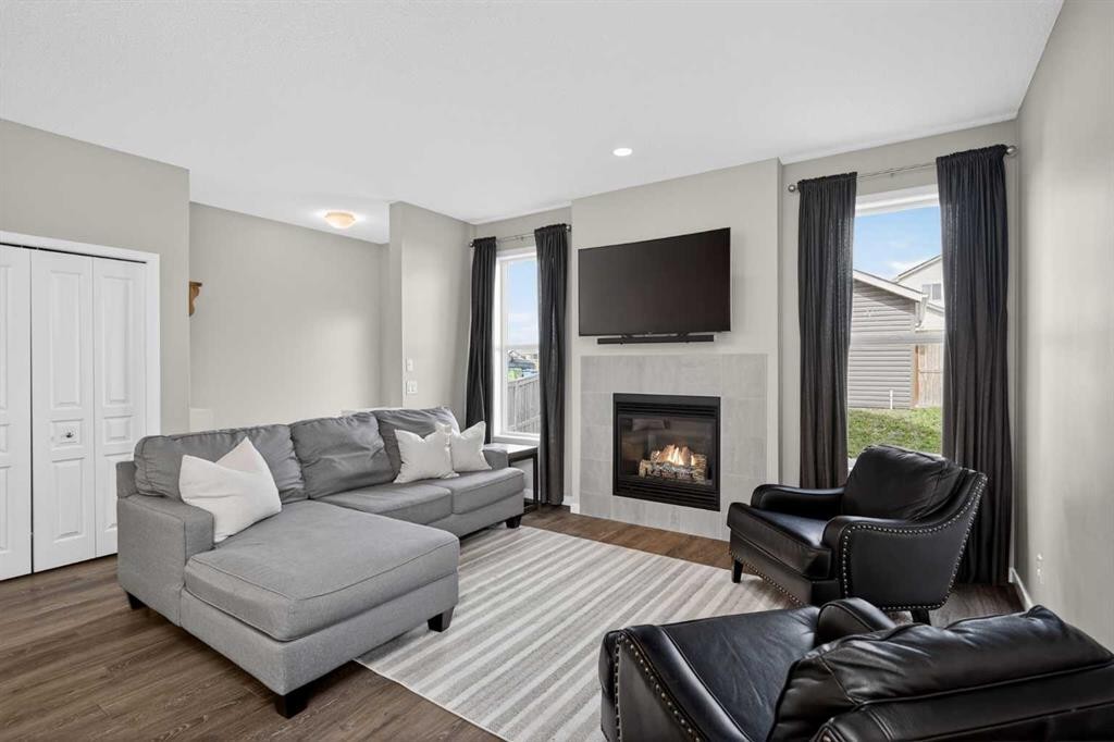 257 Cranford Park Se, Calgary, AB - Indoor Photo Showing Living Room With Fireplace