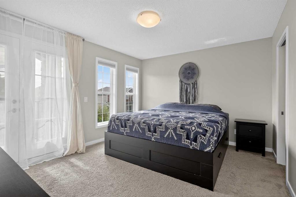 257 Cranford Park Se, Calgary, AB - Indoor Photo Showing Bedroom