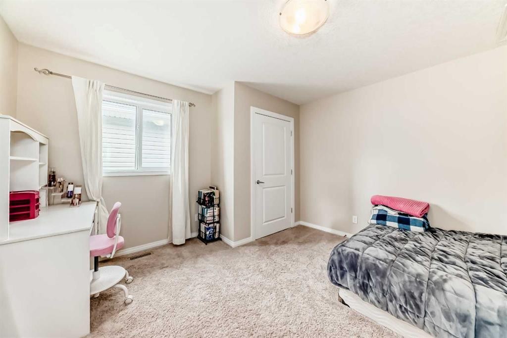 91 Nolanfield Crescent Nw, Calgary, AB - Indoor Photo Showing Bedroom