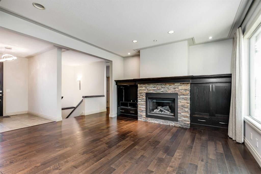 30 Meadow Pointe Drive, Heritage Pointe, AB - Indoor Photo Showing Living Room With Fireplace
