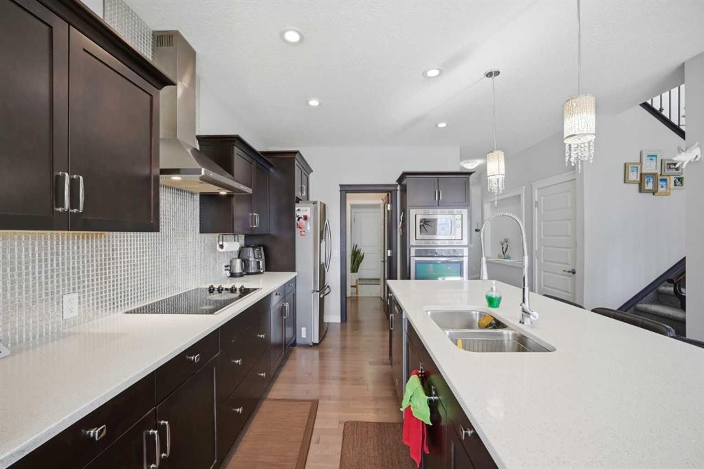 60 Redstone Grove Ne, Calgary, AB - Indoor Photo Showing Kitchen With Double Sink With Upgraded Kitchen