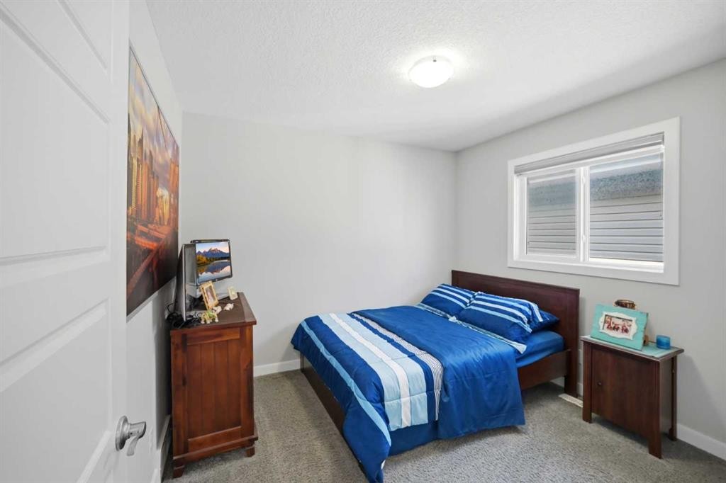 60 Redstone Grove Ne, Calgary, AB - Indoor Photo Showing Bedroom
