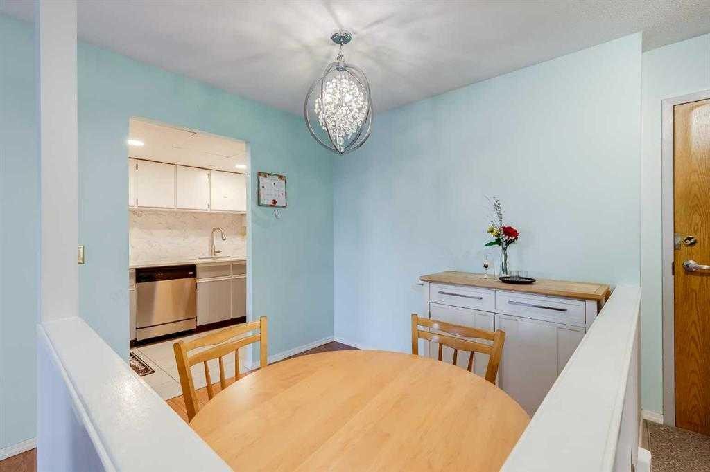 104-335 Garry Crescent Ne, Calgary, AB - Indoor Photo Showing Dining Room