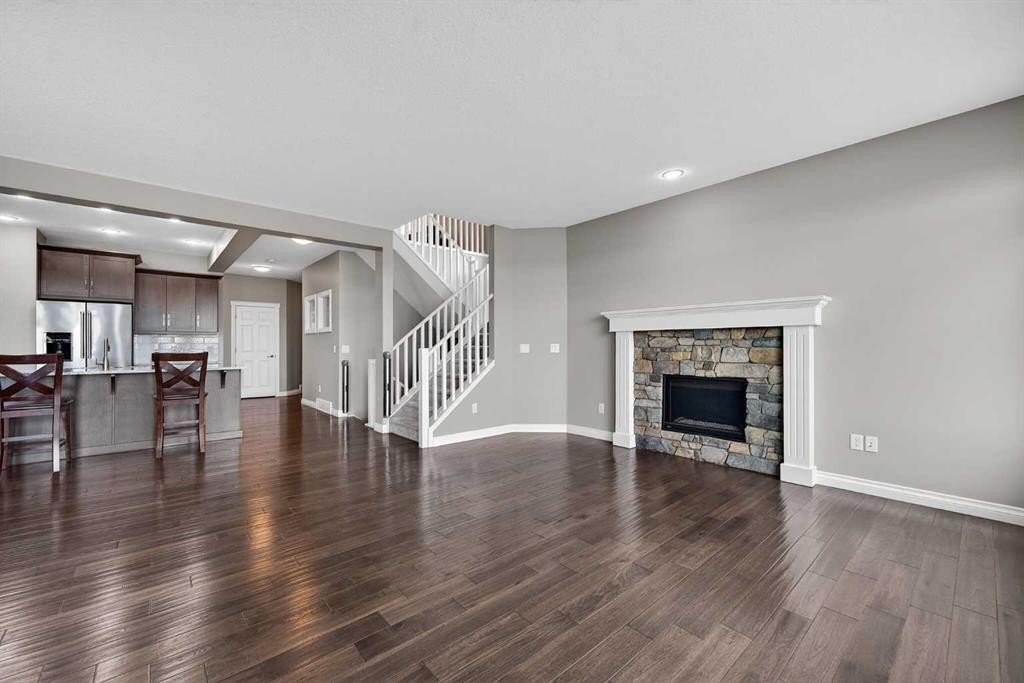 30 Evansborough View Nw, Calgary, AB - Indoor Photo Showing Living Room With Fireplace