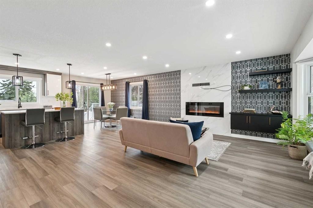 7116 Hunterwood Road Nw, Calgary, AB - Indoor Photo Showing Living Room With Fireplace