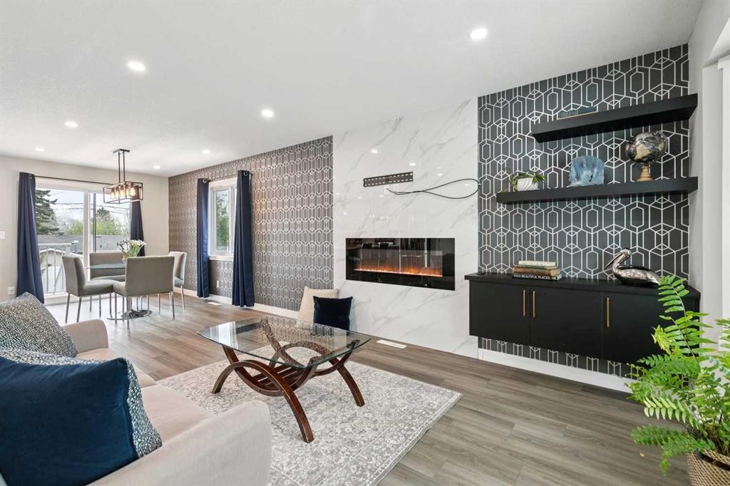 7116 Hunterwood Road Nw, Calgary, AB - Indoor Photo Showing Living Room With Fireplace