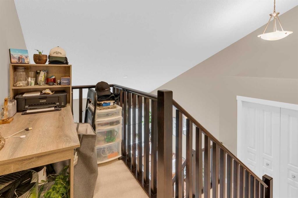 17-28 Heritage Drive, Cochrane, AB - Indoor Photo Showing Other Room