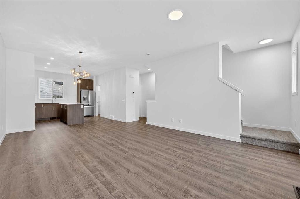 56 Creekside Drive Sw, Calgary, AB - Indoor Photo Showing Other Room