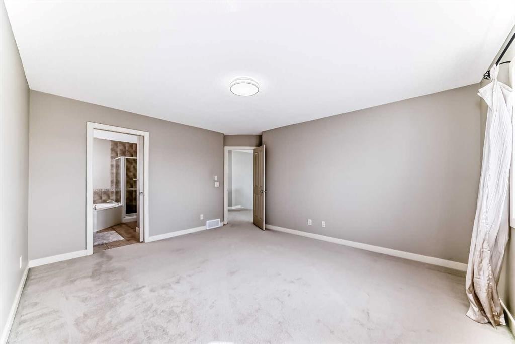 455 Hidden Creek Boulevard Nw, Calgary, AB - Indoor Photo Showing Other Room
