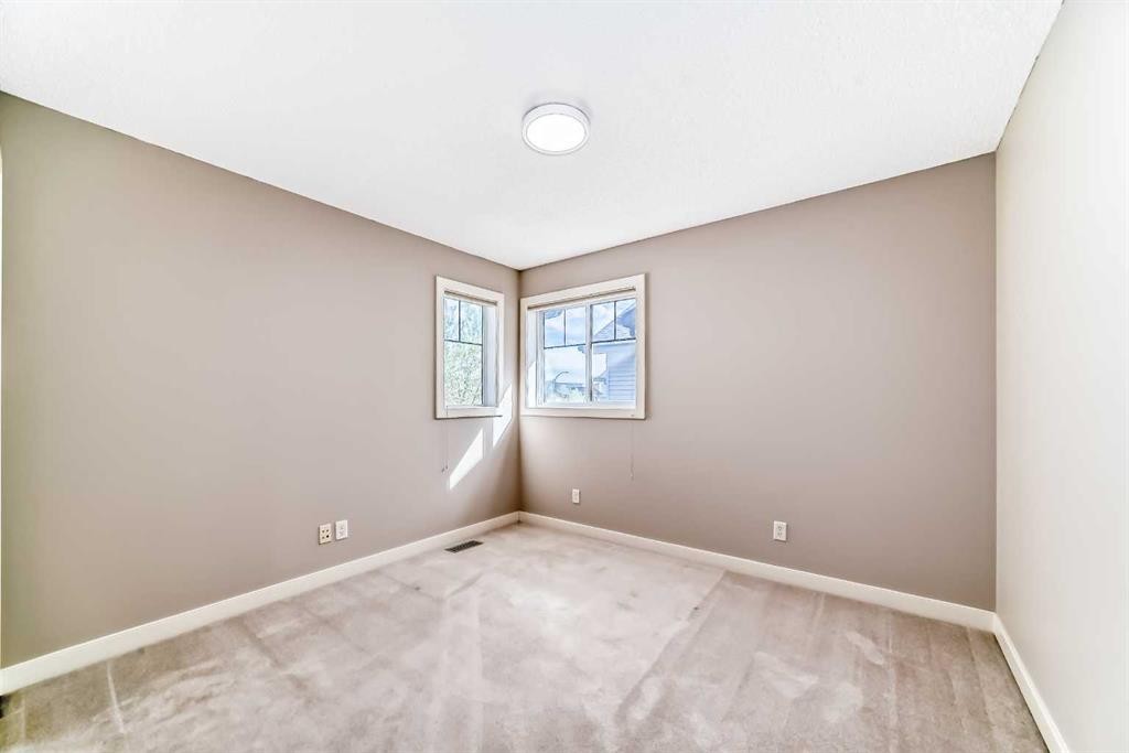 455 Hidden Creek Boulevard Nw, Calgary, AB - Indoor Photo Showing Other Room