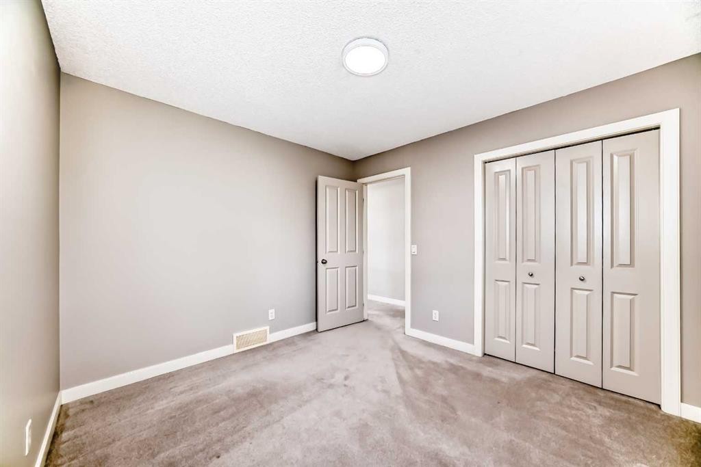 455 Hidden Creek Boulevard Nw, Calgary, AB - Indoor Photo Showing Other Room
