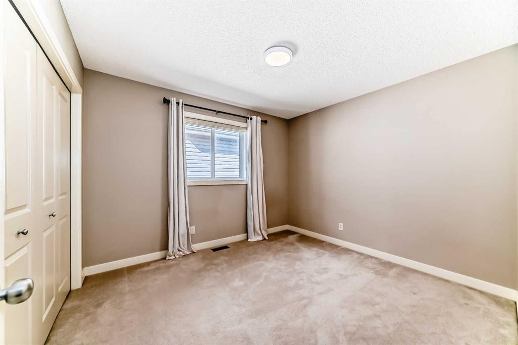455 Hidden Creek Boulevard Nw, Calgary, AB - Indoor Photo Showing Other Room