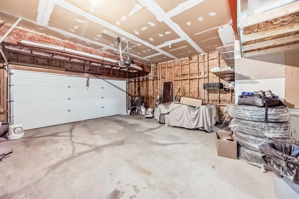 455 Hidden Creek Boulevard Nw, Calgary, AB - Indoor Photo Showing Garage