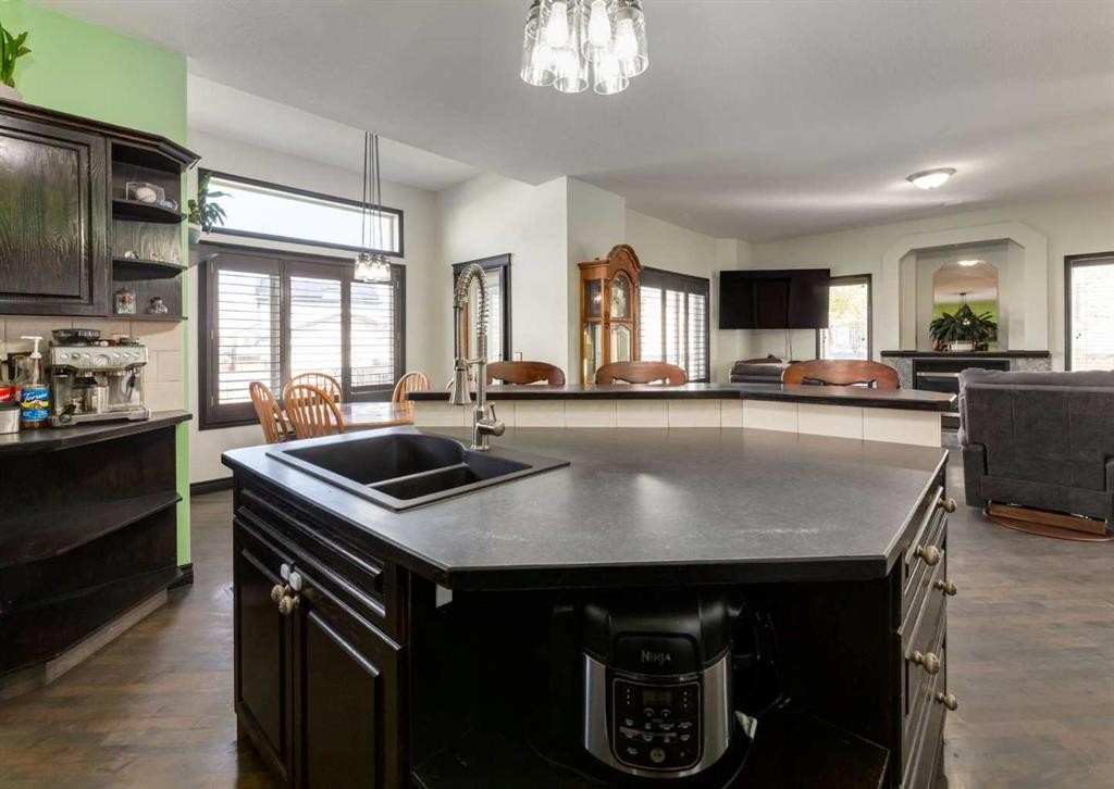 244 Stonegate Close Nw, Airdrie, AB - Indoor Photo Showing Kitchen With Double Sink