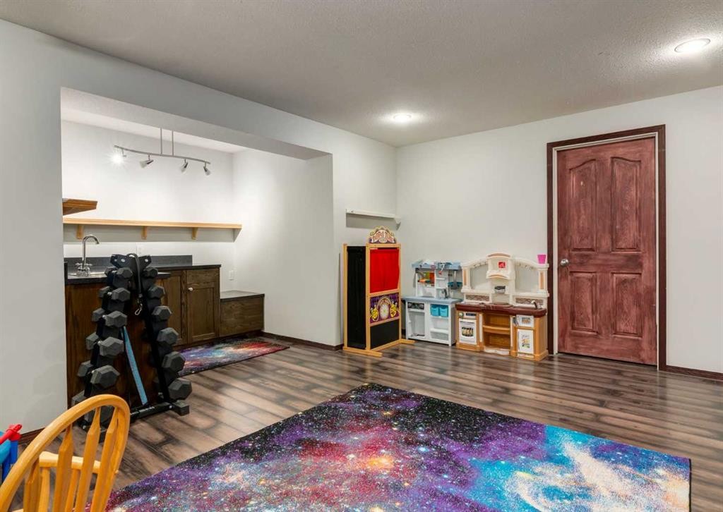 244 Stonegate Close Nw, Airdrie, AB - Indoor Photo Showing Other Room