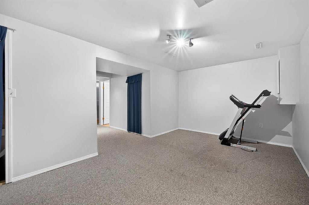 7-14736 Deerfield, Calgary, AB - Indoor Photo Showing Gym Room