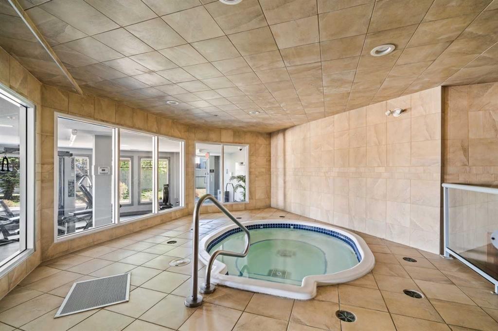 111-52 Cranfield Link Se, Calgary, AB - Indoor Photo Showing Other Room With In Ground Pool