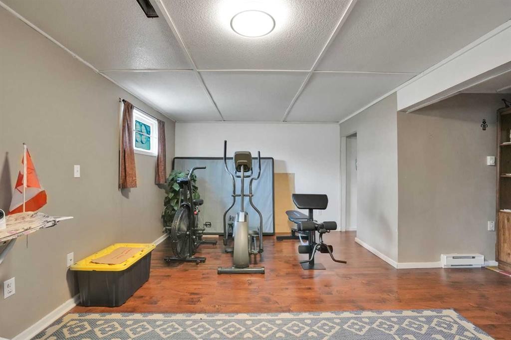 32 Taraglen Place Ne, Calgary, AB - Indoor Photo Showing Gym Room