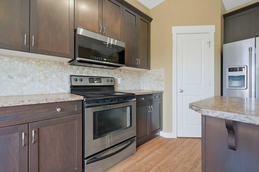 320 Rainbow Falls Drive, Chestermere, AB - Indoor Photo Showing Kitchen With Stainless Steel Kitchen