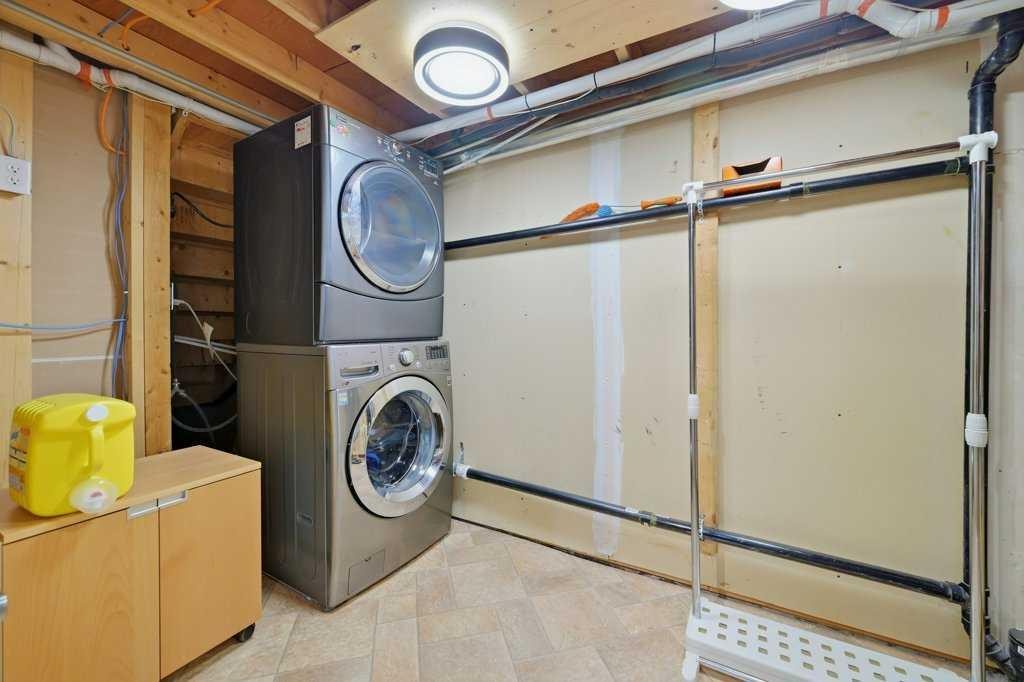 320 Rainbow Falls Drive, Chestermere, AB - Indoor Photo Showing Laundry Room