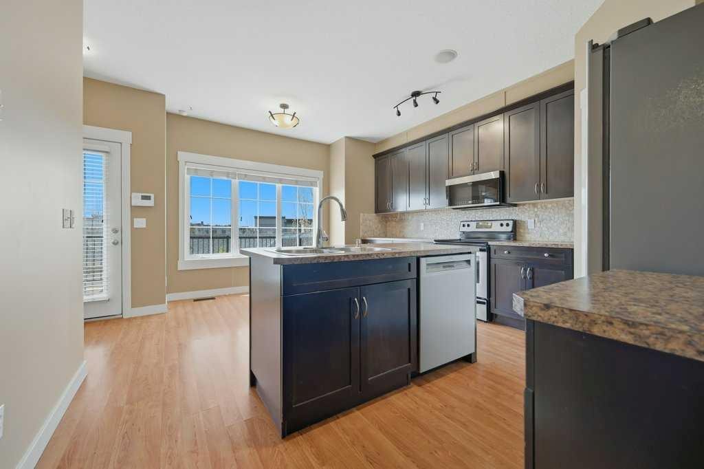 320 Rainbow Falls Drive, Chestermere, AB - Indoor Photo Showing Kitchen