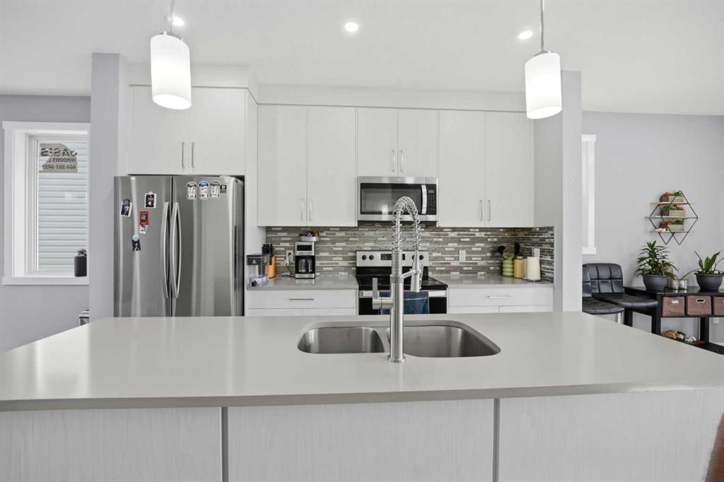 668 Cornerstone Boulevard Ne, Calgary, AB - Indoor Photo Showing Kitchen With Double Sink With Upgraded Kitchen
