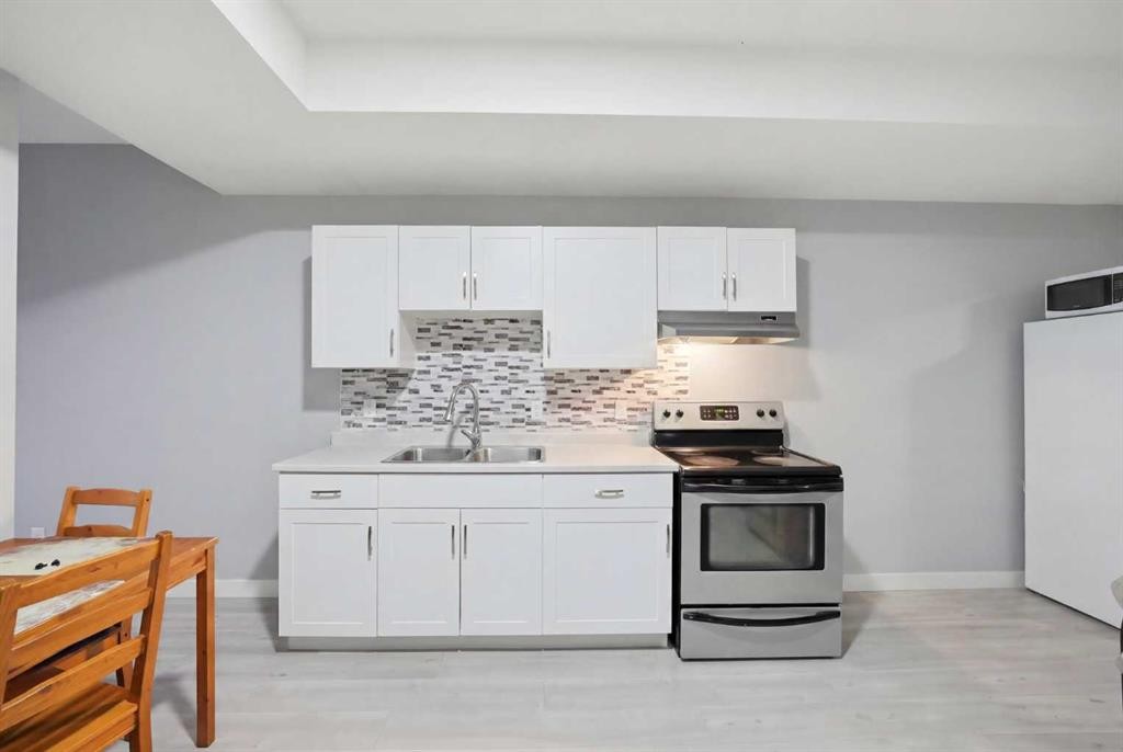 668 Cornerstone Boulevard Ne, Calgary, AB - Indoor Photo Showing Kitchen With Double Sink