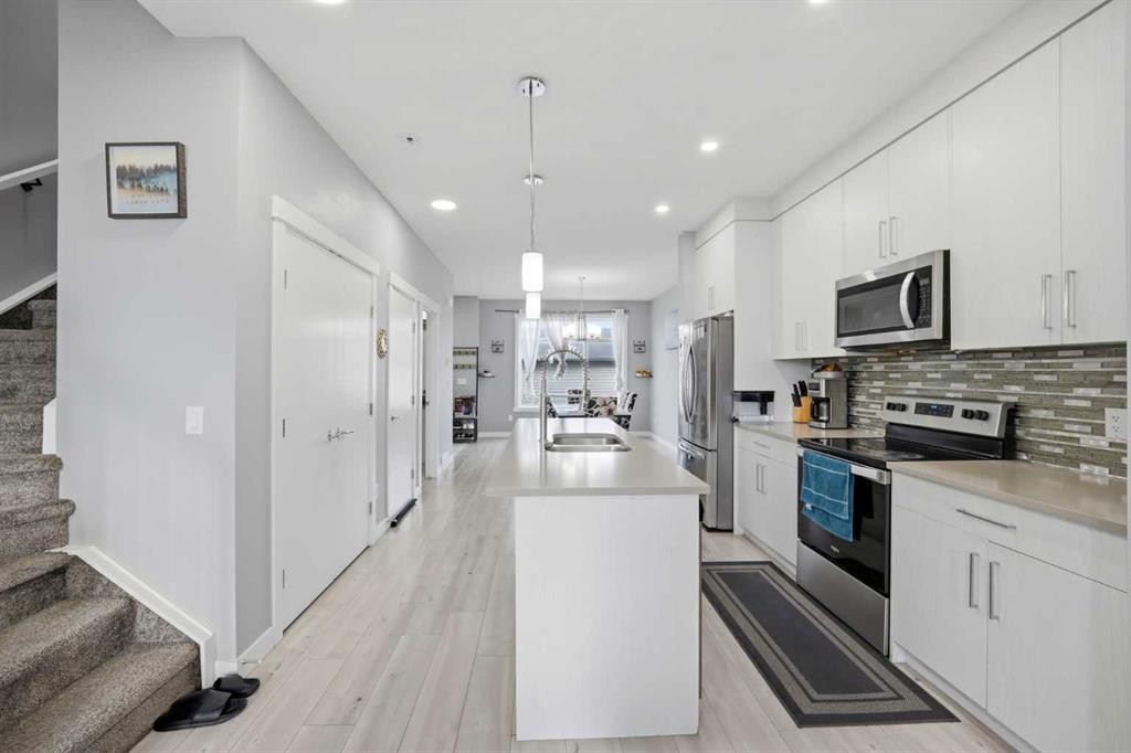 668 Cornerstone Boulevard Ne, Calgary, AB - Indoor Photo Showing Kitchen With Double Sink With Upgraded Kitchen