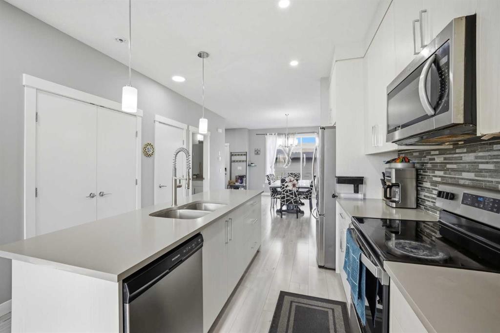 668 Cornerstone Boulevard Ne, Calgary, AB - Indoor Photo Showing Kitchen With Double Sink With Upgraded Kitchen