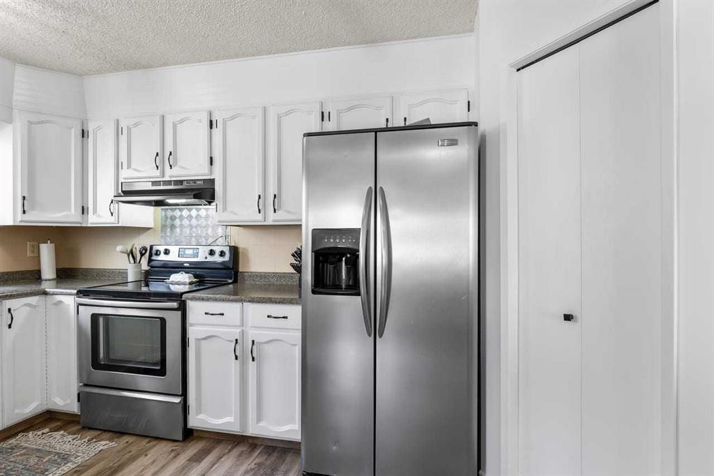 28 Beddington Crescent Ne, Calgary, AB - Indoor Photo Showing Kitchen With Stainless Steel Kitchen