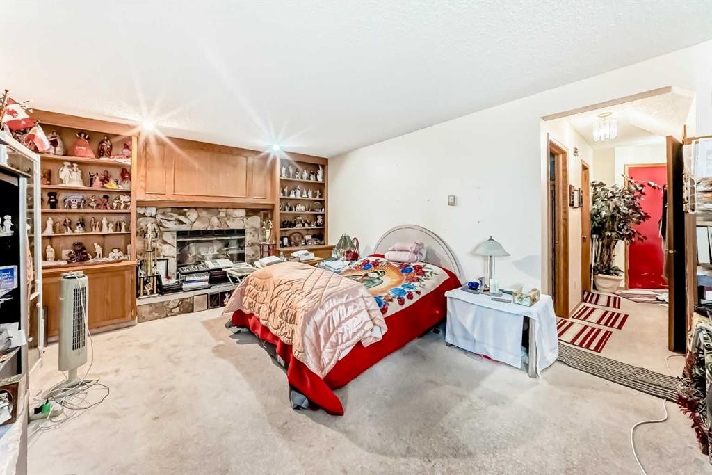 952 Applewood Drive Se, Calgary, AB - Indoor Photo Showing Other Room With Fireplace