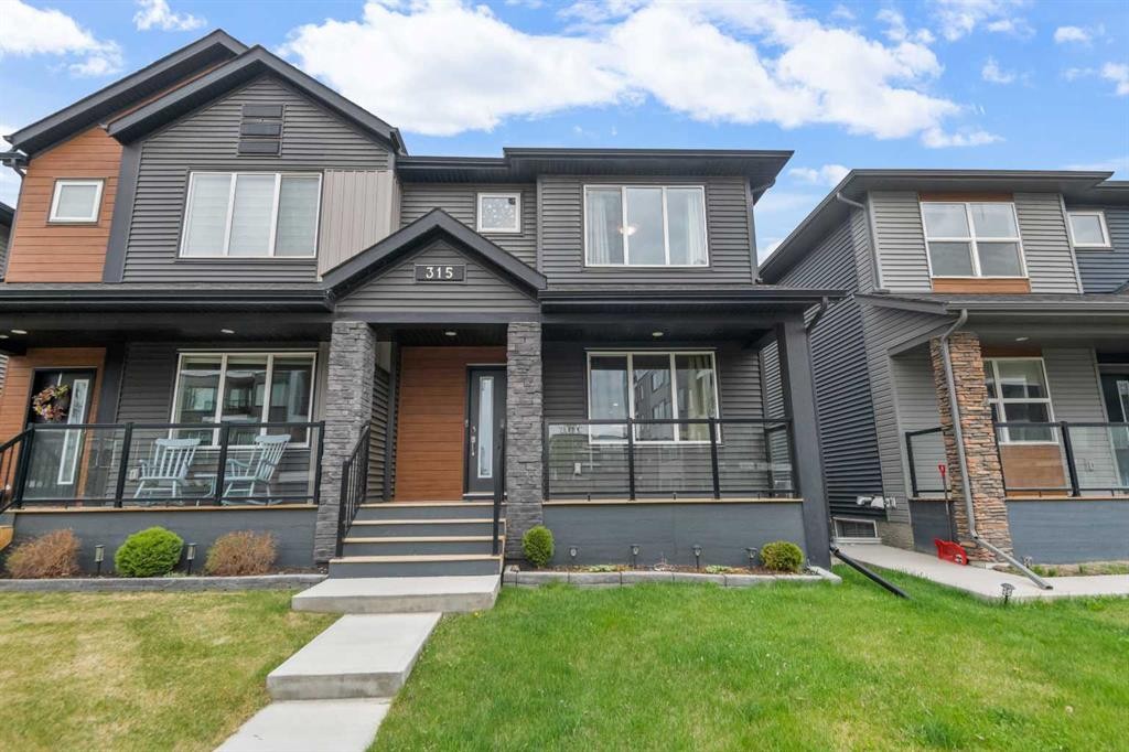 315 Wolf Creek Way Se, Calgary, AB - Outdoor With Deck Patio Veranda With Facade