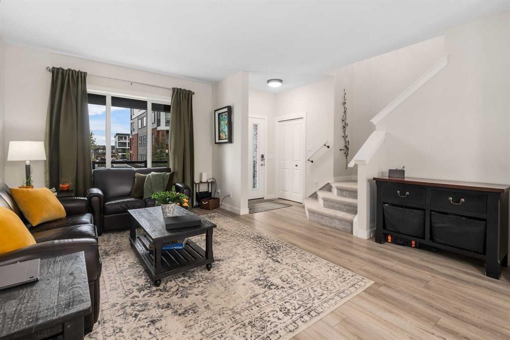 315 Wolf Creek Way Se, Calgary, AB - Indoor Photo Showing Living Room