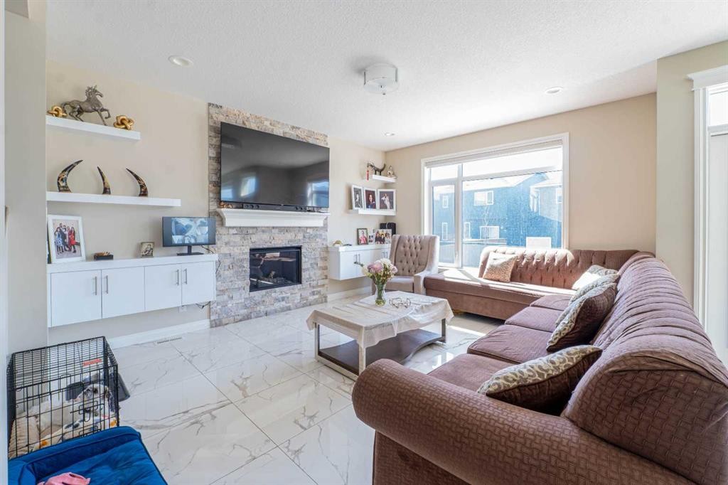 19 Red Sky Gardens Ne, Calgary, AB - Indoor Photo Showing Living Room With Fireplace