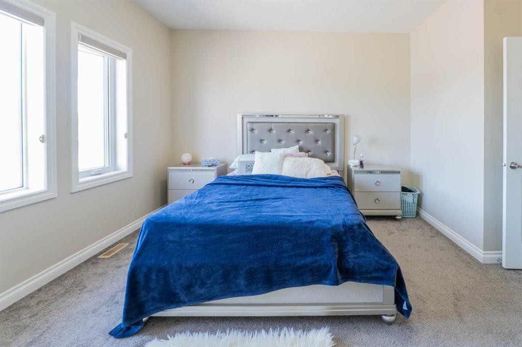 19 Red Sky Gardens Ne, Calgary, AB - Indoor Photo Showing Bedroom