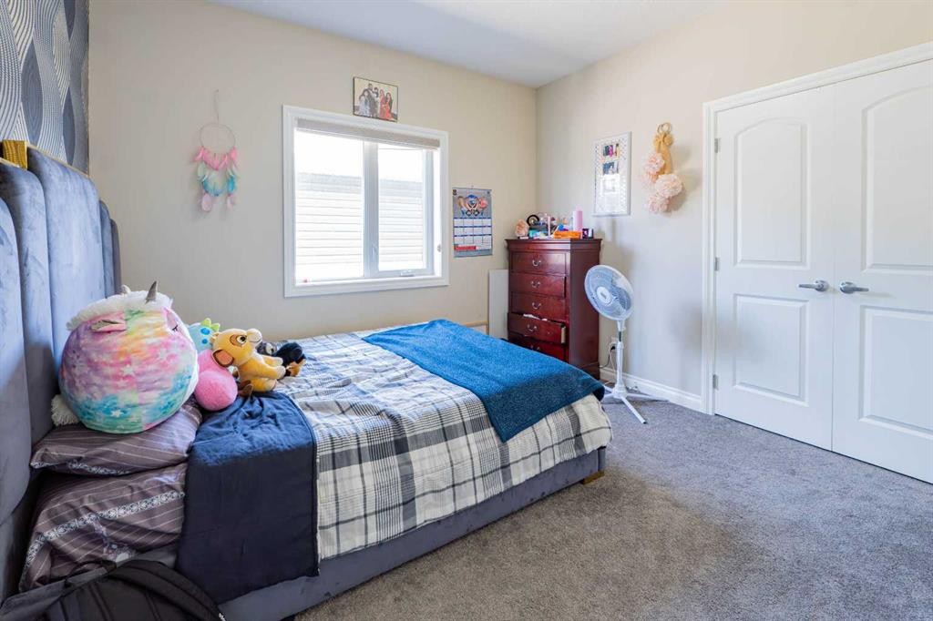 19 Red Sky Gardens Ne, Calgary, AB - Indoor Photo Showing Bedroom