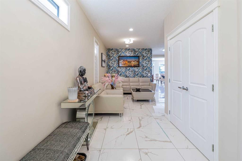 19 Red Sky Gardens Ne, Calgary, AB - Indoor Photo Showing Other Room With Fireplace