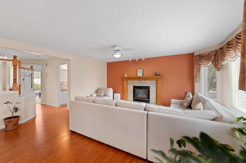 434 Douglas Woods Mews Se, Calgary, AB - Indoor Photo Showing Living Room With Fireplace