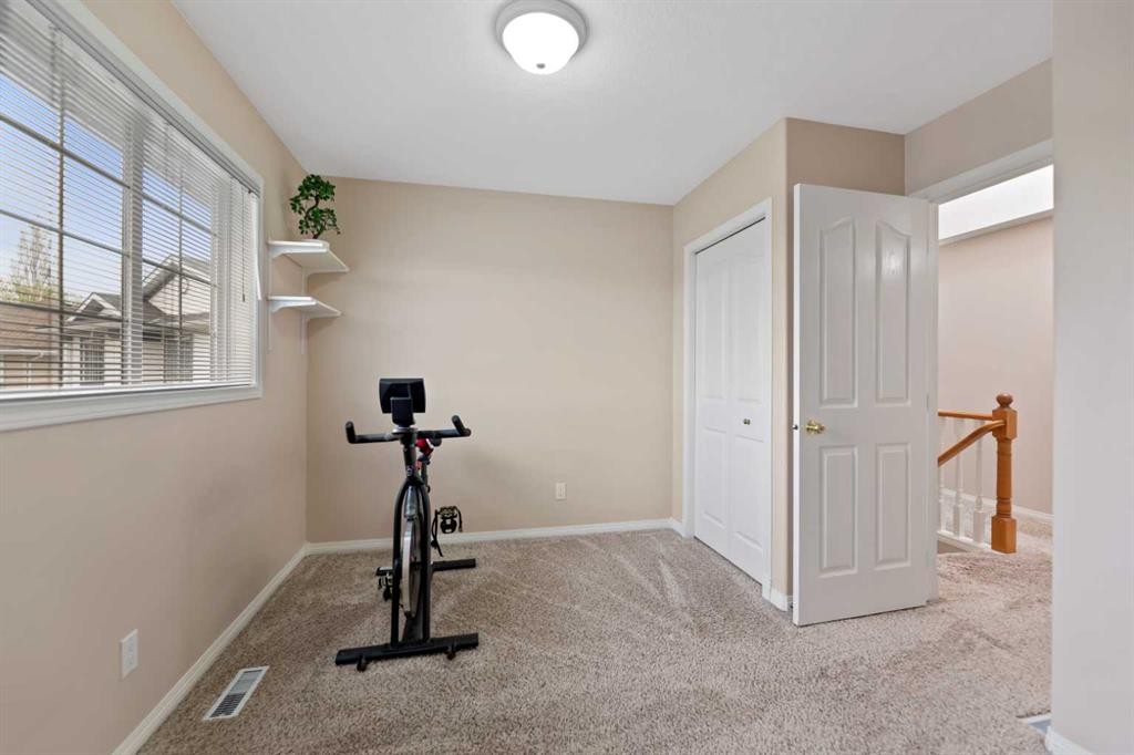 434 Douglas Woods Mews Se, Calgary, AB - Indoor Photo Showing Gym Room