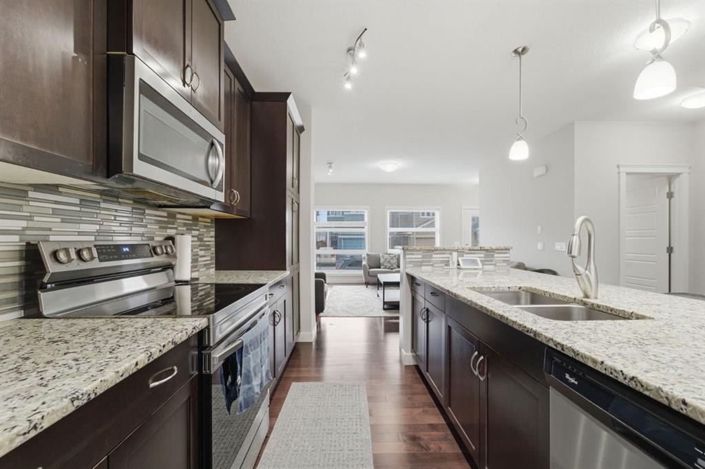 22 Redstone Road Ne, Calgary, AB - Indoor Photo Showing Kitchen With Stainless Steel Kitchen With Double Sink With Upgraded Kitchen