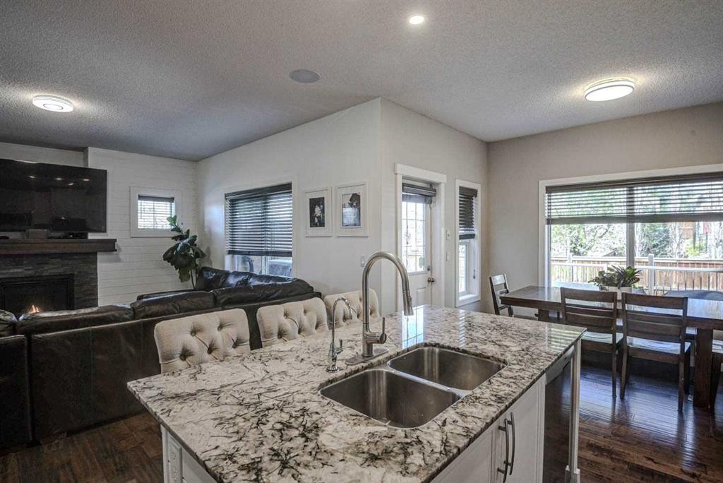 29 Drake Landing Loop, Okotoks, AB - Indoor Photo Showing Kitchen With Double Sink