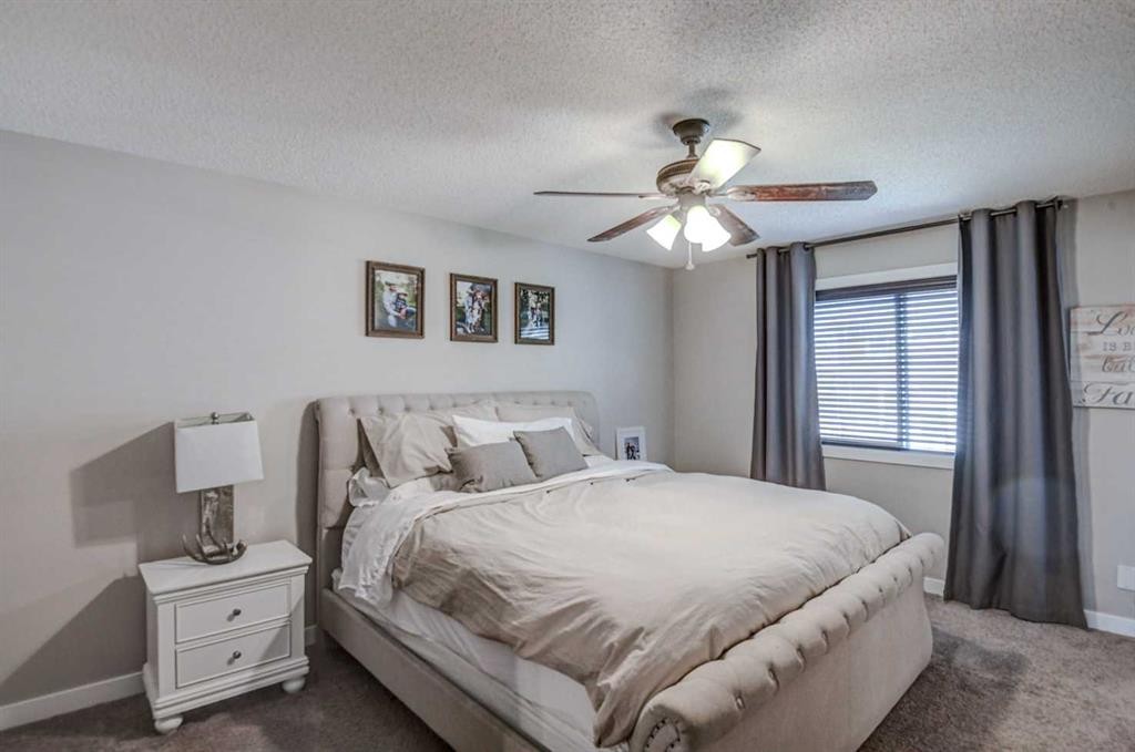 29 Drake Landing Loop, Okotoks, AB - Indoor Photo Showing Bedroom