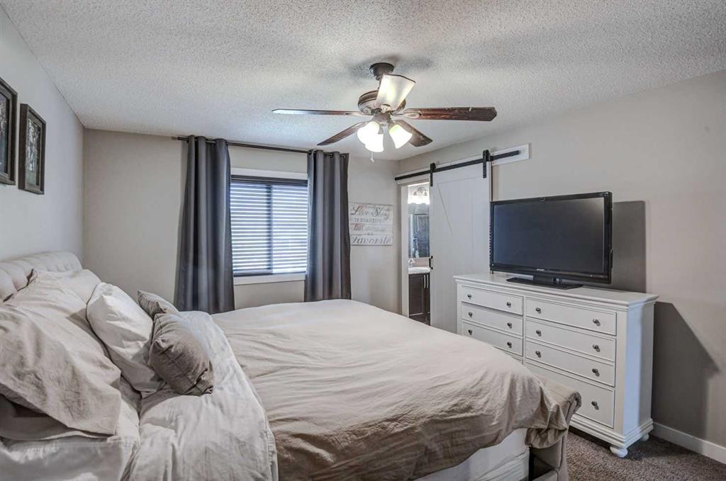 29 Drake Landing Loop, Okotoks, AB - Indoor Photo Showing Bedroom