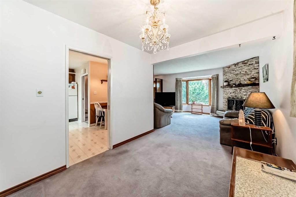3132 48 Street Sw, Calgary, AB - Indoor With Fireplace