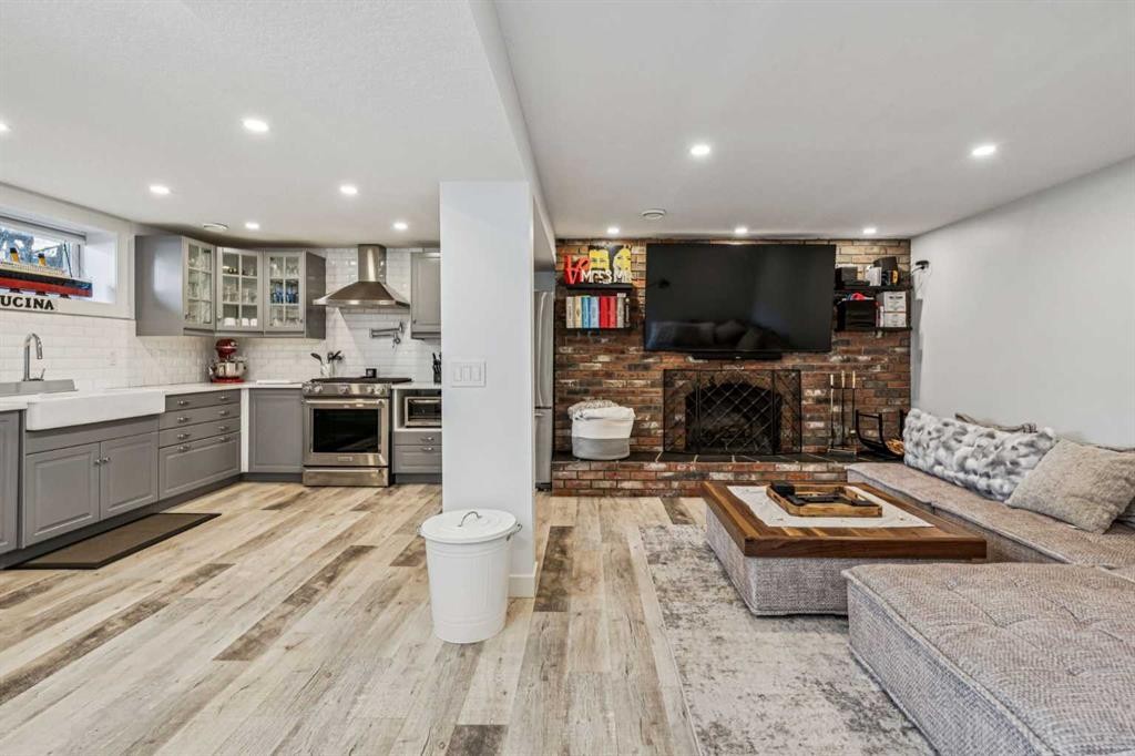 2219 Munro Drive Ne, Calgary, AB - Indoor With Fireplace