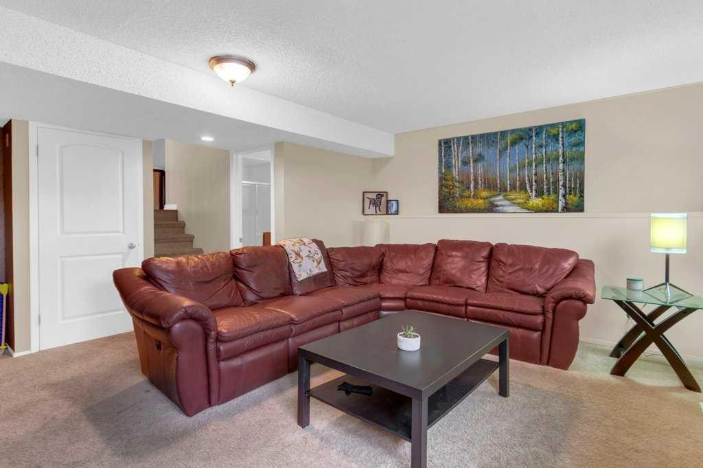 52 Strathclair Rise Sw, Calgary, AB - Indoor Photo Showing Living Room