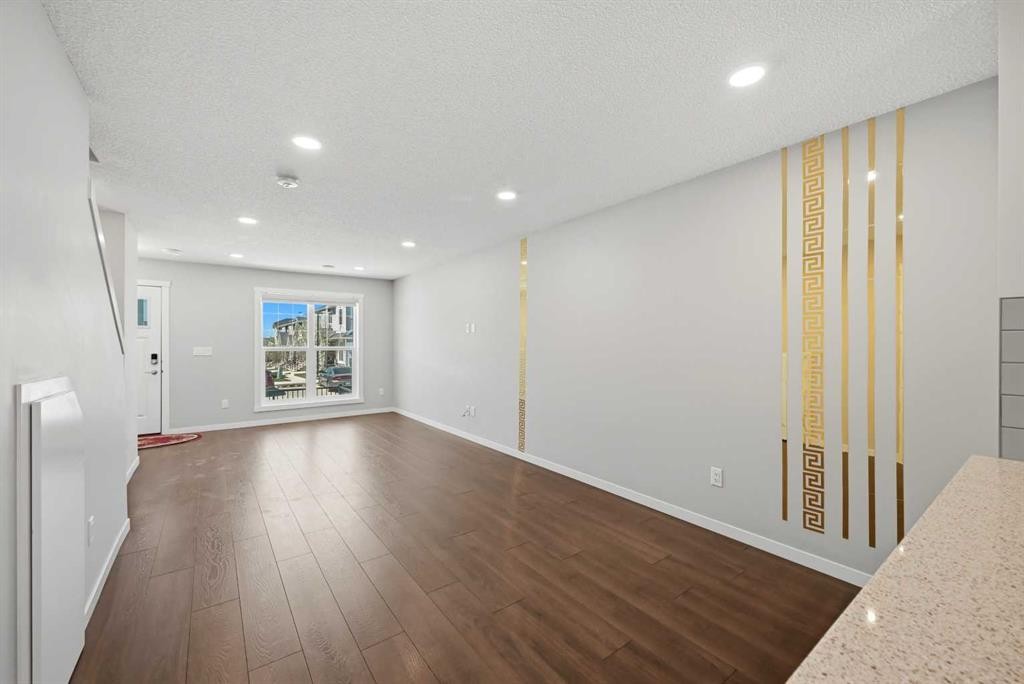 1322-7451 Falconridge Boulevard Ne, Calgary, AB - Indoor Photo Showing Other Room